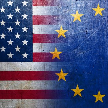 European Union and United States flags on the grunge metal backg